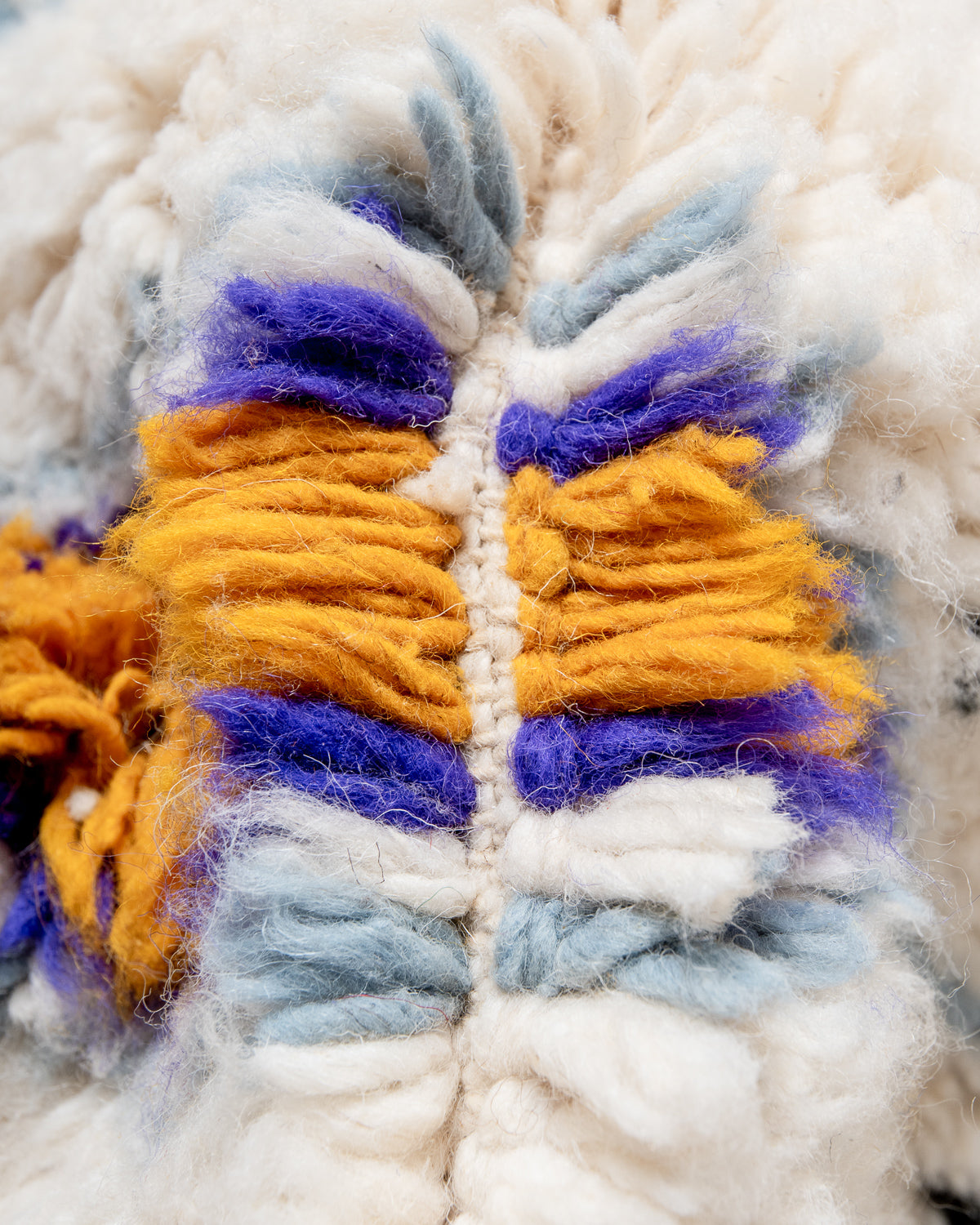 Modern, designer, handcrafted Berber rug from Morocco. Beniourain carpet with beautiful colours and patterns and fluffy wool texture.